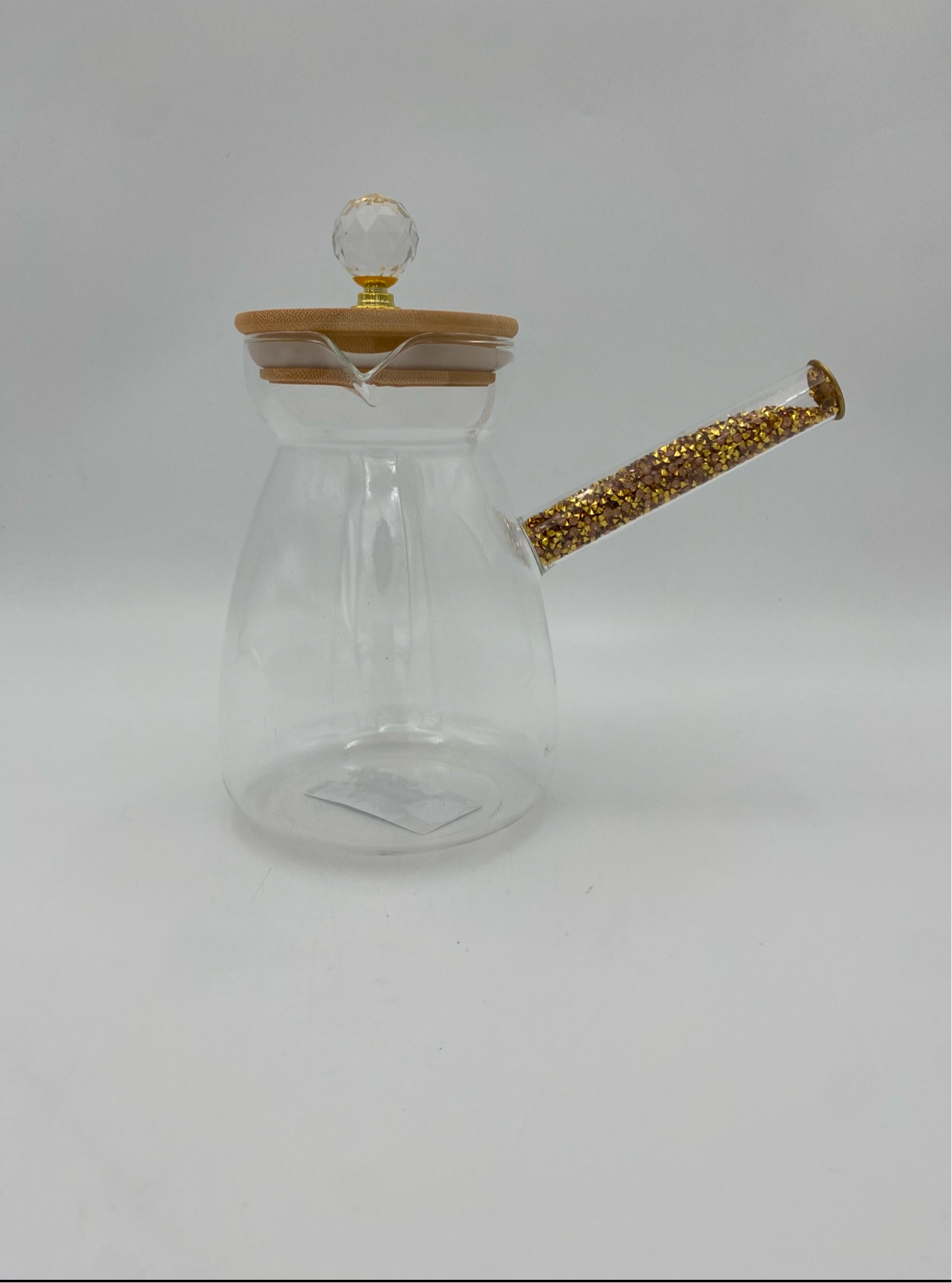 Glass coffee pot with wood lid