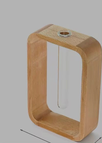 Glass tube vase with rectangular wooden stand