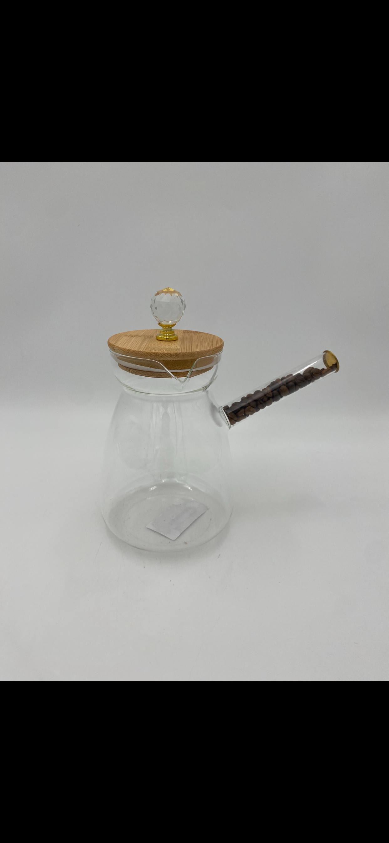 Glass coffee pot with wood lid