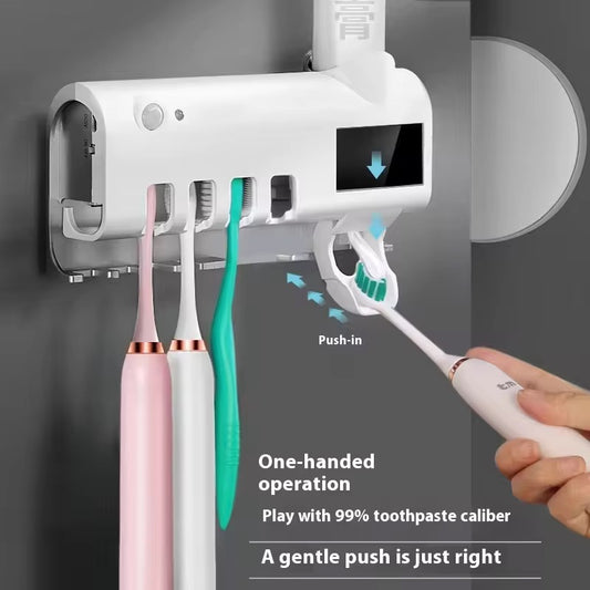 Toothbrush UV sterilizer and toothpaste squeezer
